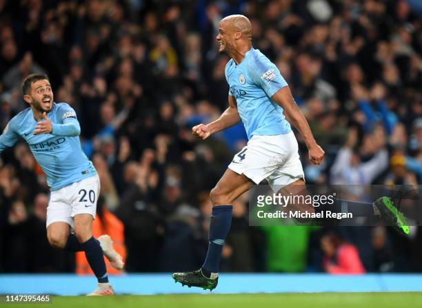 Vincent Kompany of Manchester City celebrates after scoring his team's first goal during the Premier League match between Manchester City and...