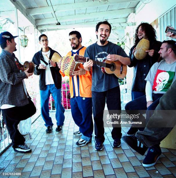 Session with Ozomatli, a seven-piece band playing primarily Latin, hip hop, and rock music, on the porch of one of their houses in Echo Park...