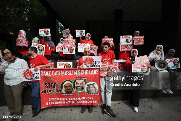 People gather in front of Saudi Consulate in New York to protest against Saudi Arabia's decision to execute three leading Saudi Arabian scholars...