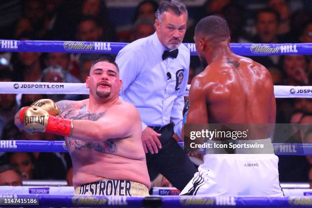 Anthony Joshua of England knocks down Andy Ruiz Jr of California during the third round of the World Heavyweight Championship fight on June 1, 2019...