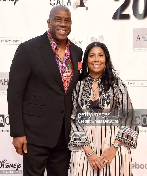 Magic Johnson and Cookie Johnson arrive at the WACO Theater Center's 3rd Annual Wearable Art Gala at The Barker Hangar at Santa Monica Airport on...