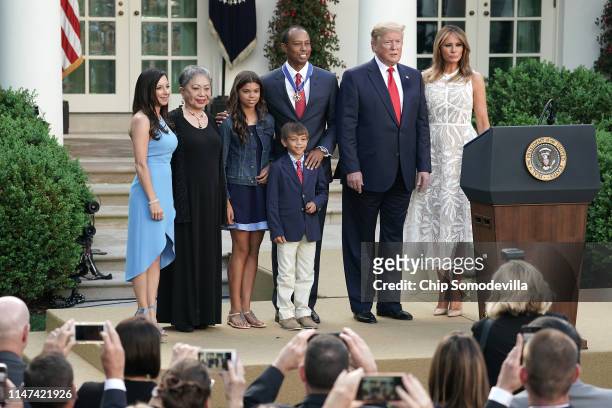 Erica Herman, Kultida Woods, Sam Alexis Woods, Charlie Axel Woods, Tiger Woods, U.S. President Donald Trump and first lady Melania Trump pose for...