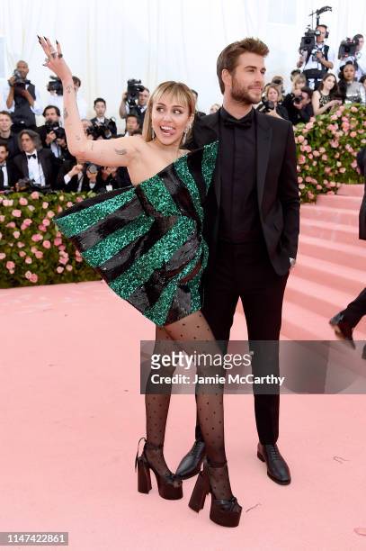 Miley Cyrus and Liam Hemsworth attend The 2019 Met Gala Celebrating Camp: Notes on Fashion at Metropolitan Museum of Art on May 06, 2019 in New York...
