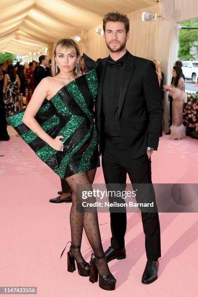 Miley Cyrus and Liam Hemsworth attend The 2019 Met Gala Celebrating Camp: Notes on Fashion at Metropolitan Museum of Art on May 06, 2019 in New York...