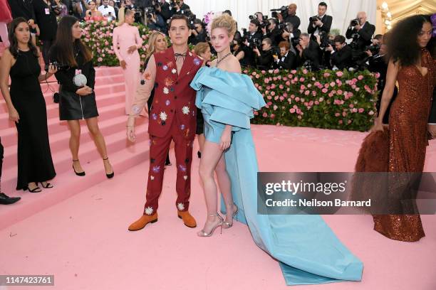 Cole Sprouse and Lily Reinhart attend The 2019 Met Gala Celebrating Camp: Notes on Fashion at Metropolitan Museum of Art on May 06, 2019 in New York...