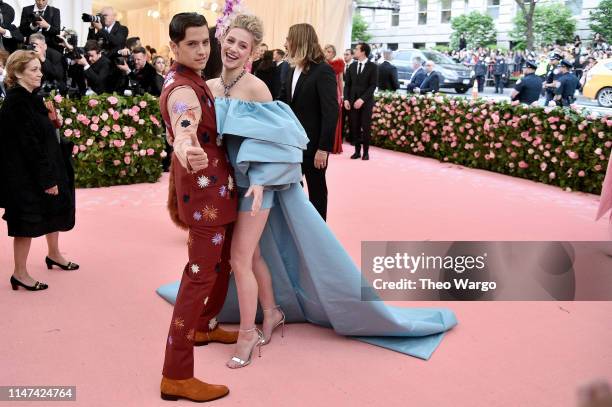 Cole Sprouse and Lily Reinhart attend The 2019 Met Gala Celebrating Camp: Notes on Fashion at Metropolitan Museum of Art on May 06, 2019 in New York...