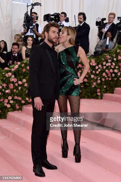 Liam Hemsworth and Miley Cyrus attend The 2019 Met Gala Celebrating Camp: Notes on Fashion at Metropolitan Museum of Art on May 06, 2019 in New York...