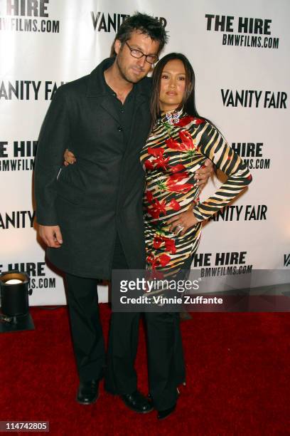 Tia Carrere and Simon Wakelin attending the Vanity Fair sponsored premeire of BMW's web movies series "The Hire" second season in Los Angeles 10/17/02
