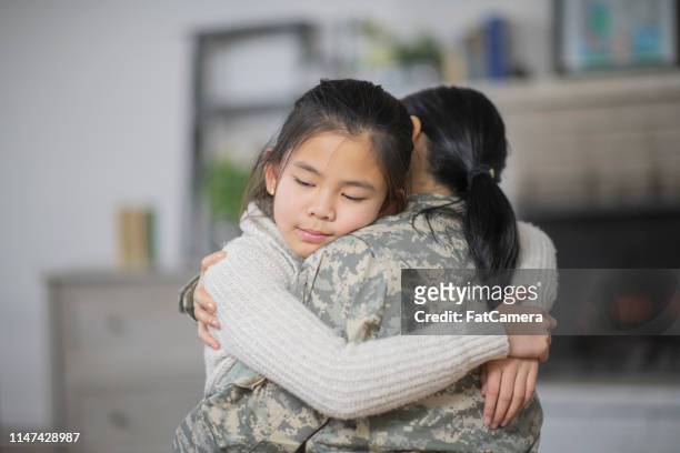 saying goodbye - filipino family reunion stock pictures, royalty-free photos & images