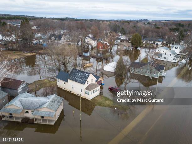 houses on barker's point flooded by the waters of the saint john river, fredericton, new brunswick, canada - brunswick centre stock pictures, royalty-free photos & images