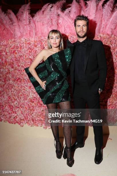 Miley Cyrus and Liam Hemsworth attends The 2019 Met Gala Celebrating Camp: Notes on Fashion at Metropolitan Museum of Art on May 06, 2019 in New York...