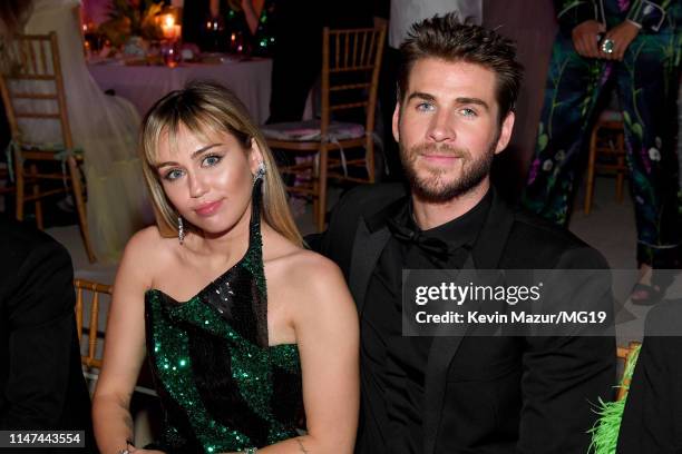 Miley Cyrus and Liam Hemsworth attend The 2019 Met Gala Celebrating Camp: Notes on Fashion at Metropolitan Museum of Art on May 06, 2019 in New York...