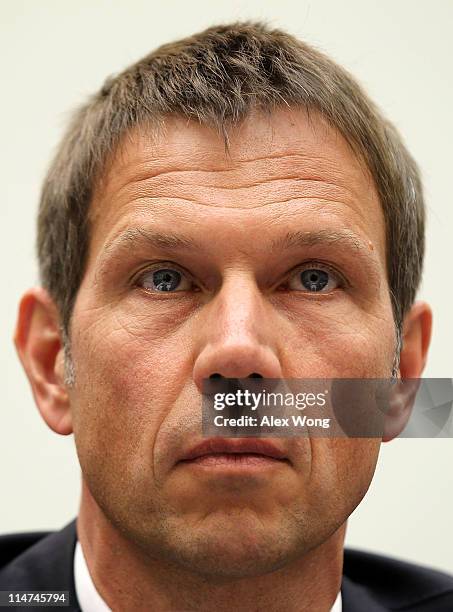 Of Deutsche Telekom AG Rene Obermann listens during a hearing before the Intellectual Property, Competition and the Internet Subcommittee of the...