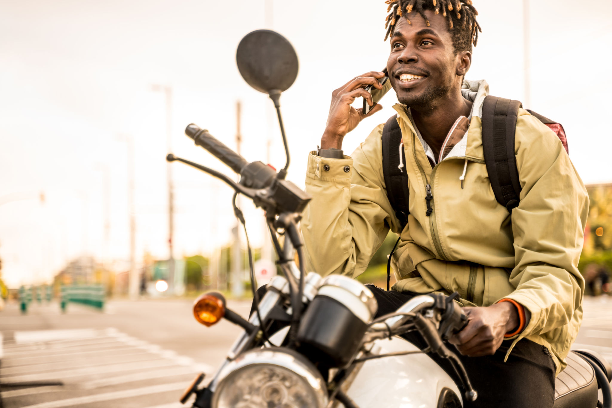 Young man on a motorbike in Barcelona Young man on a motorbike in Barcelona