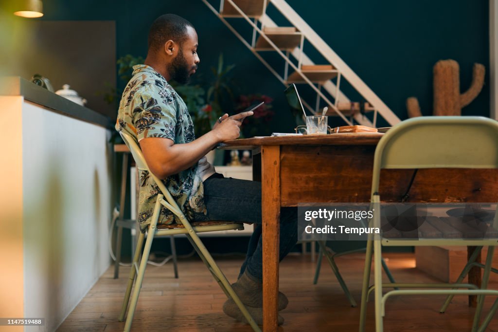 Millenial Using Technology Young Millennial Using Technology For His Investment And On Line ...