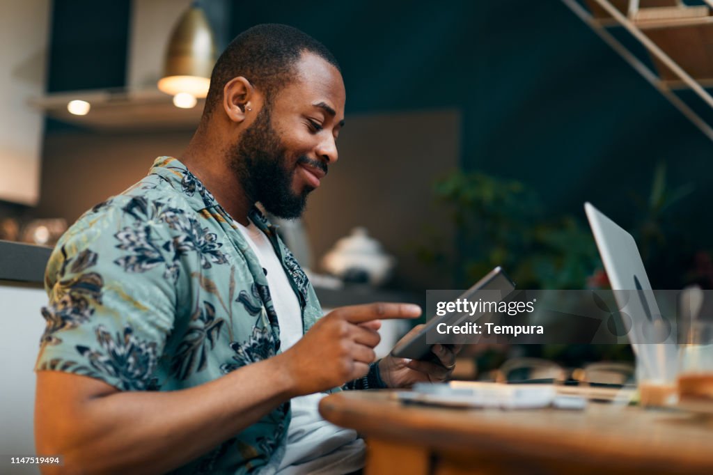 Millenial Using Technology Young Millennial Using Technology For His Investment And On Line ...