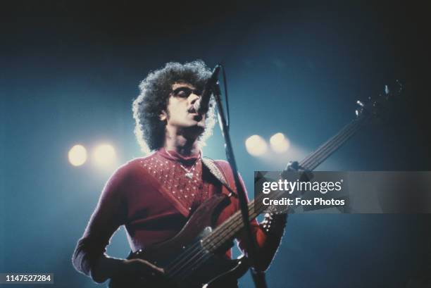 Irish musician Phil Lynott of rock group Thin Lizzy, in concert, 1986.