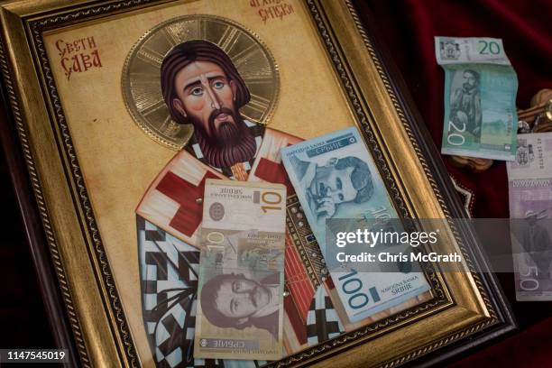 Serbian dinar donations are seen at the Saint Sava Serbian Orthodox Church in the ethnic Albanian southern part of the city on May 5, 2019 in...