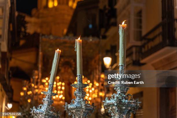 spanish holy week in malaga city, candles detail shot - 聖週 個照片及圖片檔