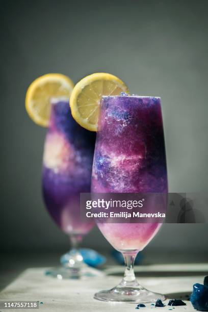 galaxy lemonade. close changing lemonade - slush stock-fotos und bilder