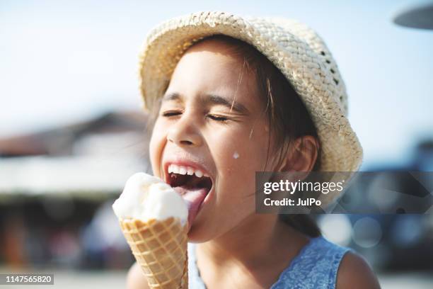 kids eating ice-cream - cone shape stock pictures, royalty-free photos & images