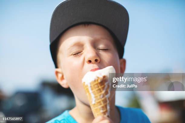 kids eating ice-cream - cream mouth stock pictures, royalty-free photos & images