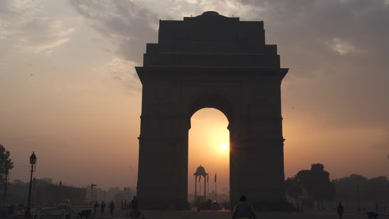 https://media.gettyimages.com/id/1147568444/video/gimbal-clip-walking-towards-india-gate-at-sunrise-with-sun-inside-arch.jpg?b=1&s=640x640&k=20&c=xaSMoiwYfgcBAF6M7gPk1jnO_0qXKssAvriB-76FZTY=