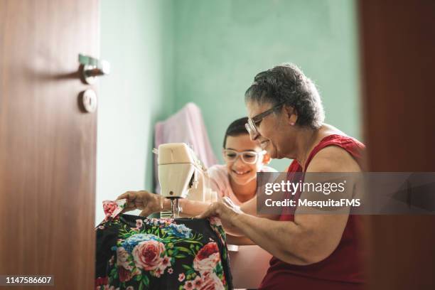 kärleken till arbetet - woman sewing bildbanksfoton och bilder