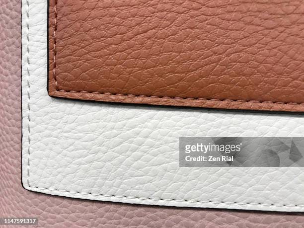 three tone colored handbag material with stitchings and layered effect - sac à main blanc photos et images de collection