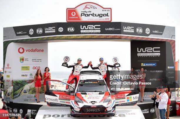 Ott Tanak of Estonia and Martin Jarveoja of Estonia celebrates the victory of the rally at the award ceremony awards for the WRC Portugal on June 02,...