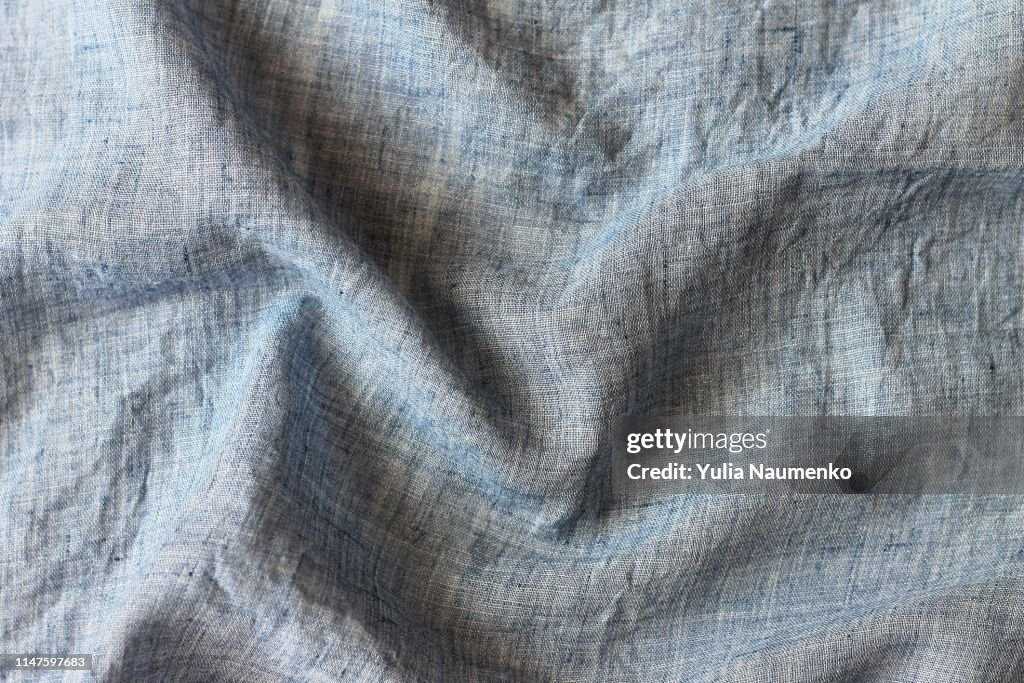 Close up gray crumpled linen background