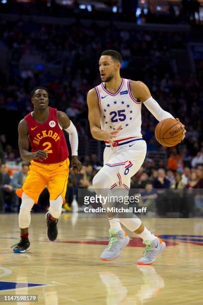 Ben Simmons of the Philadelphia 76ers dribbles the ball against Darren Collison of the Indiana Pacers at the Wells Fargo Center on March 10, 2019 in...