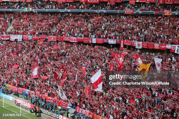 Liverpool fans hold up their scarves as they sing You'll Never Walk Alone ahead of the UEFA Champions League Final between Tottenham Hotspur and...