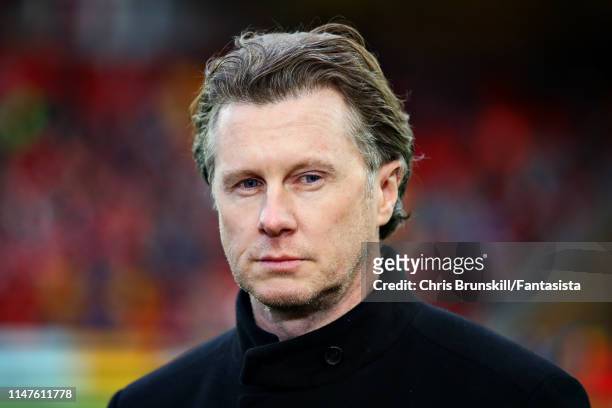 Steve McManaman looks on before the UEFA Champions League Semi Final second leg match between Liverpool and Barcelona at Anfield on May 07, 2019 in...
