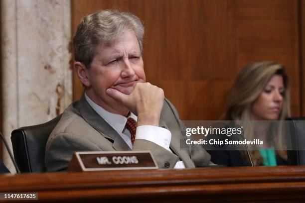 Senate Financial Services and General Government Subcommittee Chairman John Kennedy listens to Federal Communication Commission Chairman Ajit Pai and...