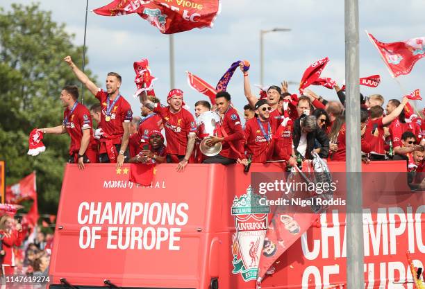 James Milner, Jordan Henderson, Alex Oxlade-Chamberlain, Daniel Sturridge, Alberto Moreno, Trent Alexander-Arnold and Adam Lallana of Liverpool with...