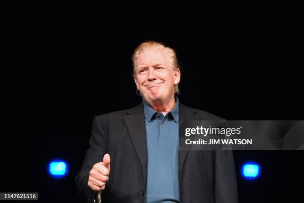 President Donald Trump gestures as he visits McLean Bible Church in Vienna, Virginia on June 2 to pray for the victims and community of Virginia...