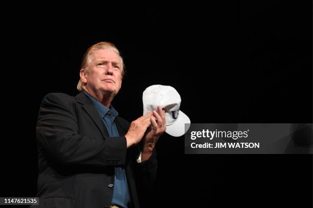 President Donald Trump looks on as he visits McLean Bible Church in Vienna, Virginia on June 2 to pray for the victims and community of Virginia...