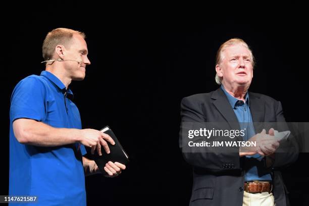 President Donald Trump looks on next to Pastor David Platt as he visits McLean Bible Church in Vienna, Virginia on June 2 to pray for the victims and...