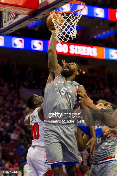 Amir Johnson of the Philadelphia 76ers reaches for the ball against the Chicago Bulls at the Wells Fargo Center on April 10, 2019 in Philadelphia,...