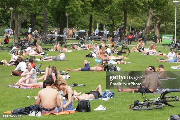 People enjoying at the Vondelpark on June 2, 2019 in Amsterdam,Netherlands. Temperatures of 30 degrees Celcius were forecast in some regions of the...