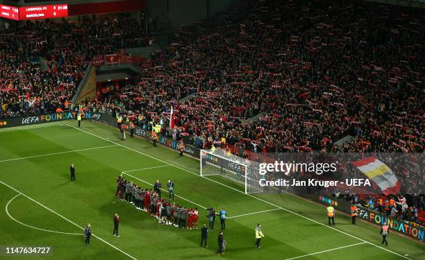 Liverpool players celebrate the win with their fans during the UEFA Champions League Semi Final second leg match between Liverpool and Barcelona at...