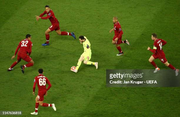 Lionel Messi of Barcelona controls the ball from Trent Alexander-Arnold, Joel Matip, Virgil van Dijk, Fabinho and Jordan Henderson of Liverpool...