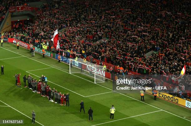 Liverpool players celebrate the win with their fans during the UEFA Champions League Semi Final second leg match between Liverpool and Barcelona at...