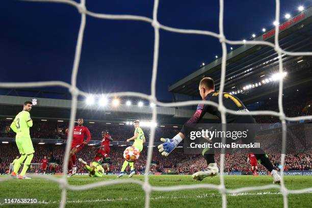 Marc-Andre Ter Stegan of Barcelona fails to stop Georginio Wijnaldum of Liverpool from scoring his team's second goal during the UEFA Champions...