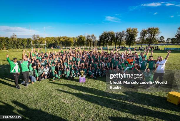 Players from Camioneros Rugby Club pose with the Webb Ellis Cup during day one of the Rugby World Cup 2019 Trophy Tour on June 2, 2019 in Buenos...