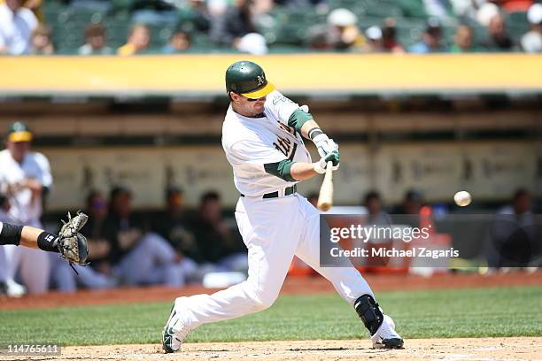 Andy LaRoche of the Oakland Athletics hitting during the game against the Chicago White Sox at the Oakland-Alameda County Coliseum on May 15, 2011 in...