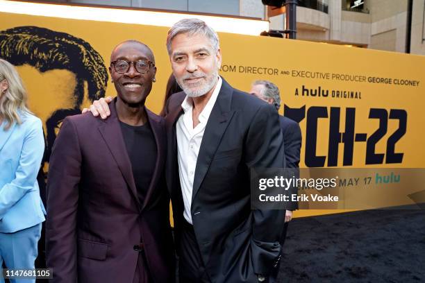 Don Cheadle and George Clooney attend the premiere of Hulu's "Catch-22" on May 07, 2019 in Hollywood, California.