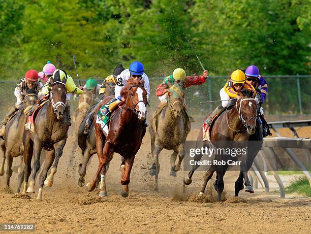 Jockey Jesus Castanon guides Shackleford out of the fourth turn to win the 136th running of the Preakness Stakes at Pimlico Race Course on May 21,...