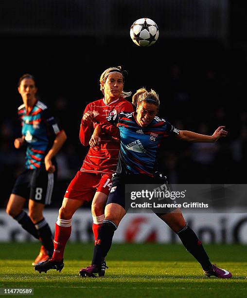 Camile Abily of Lyon battles with Jennifer Zietz of Turbine Potsdam during the UEFA Women's Champions League Final between Lyon and Turbine Potsdam...